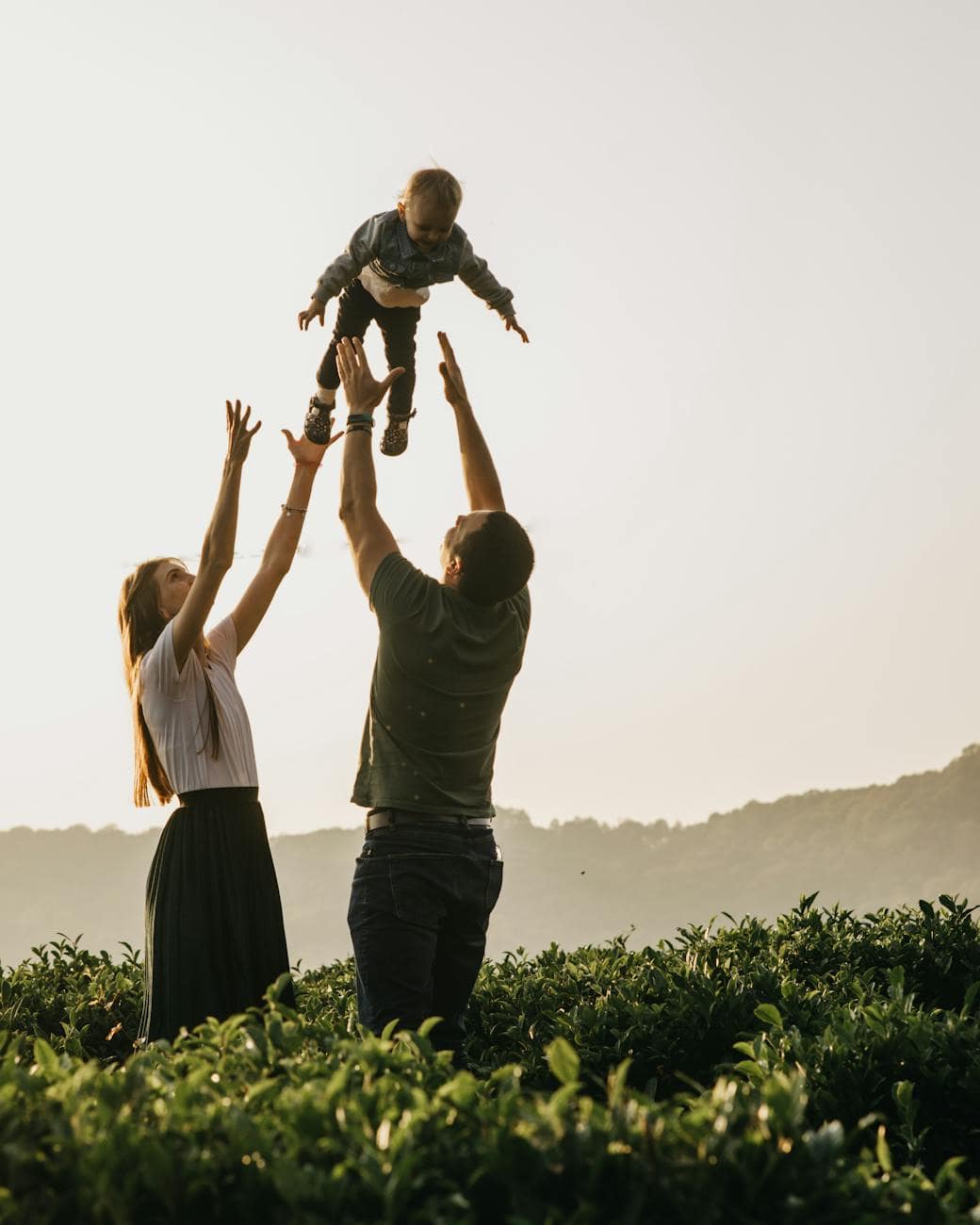 happy family having fun in countryside